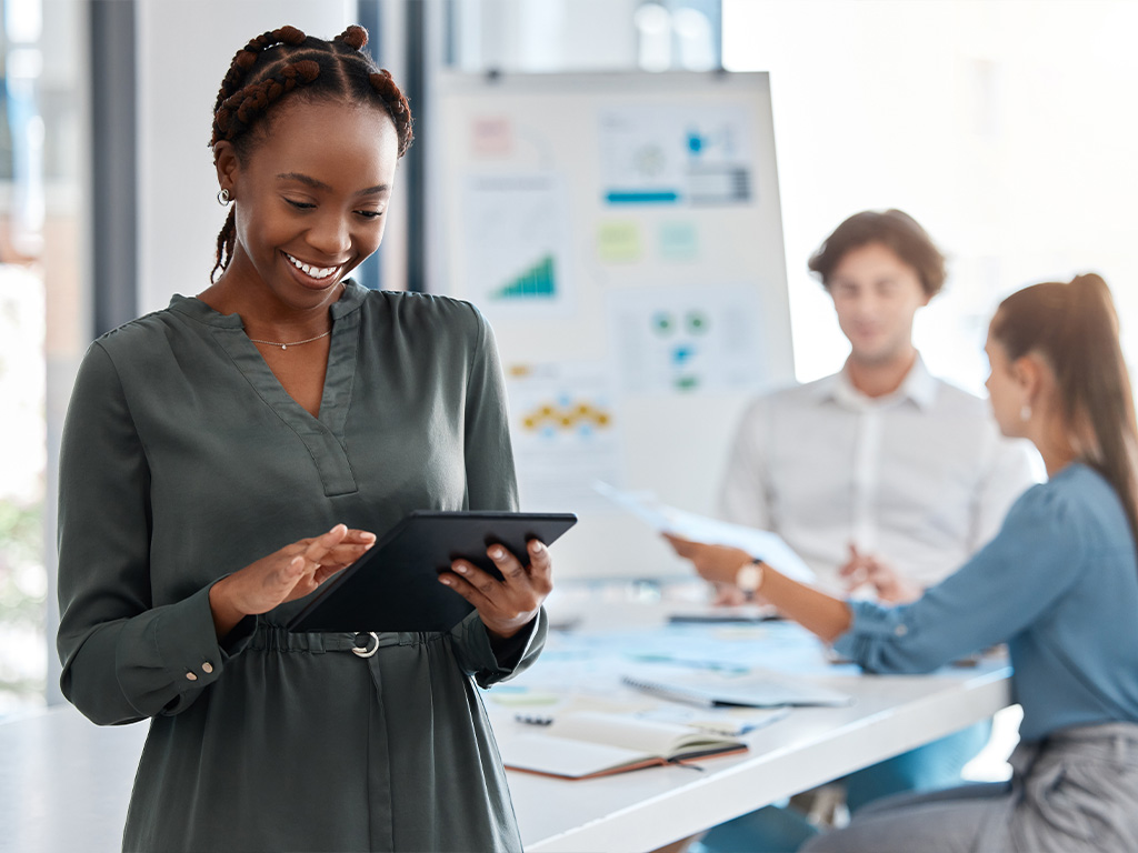 Woman happy after seeing business growth through digital advertising with Trend Media